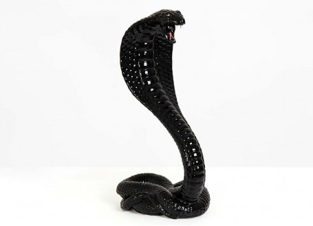 Statue black cobra in ceramic