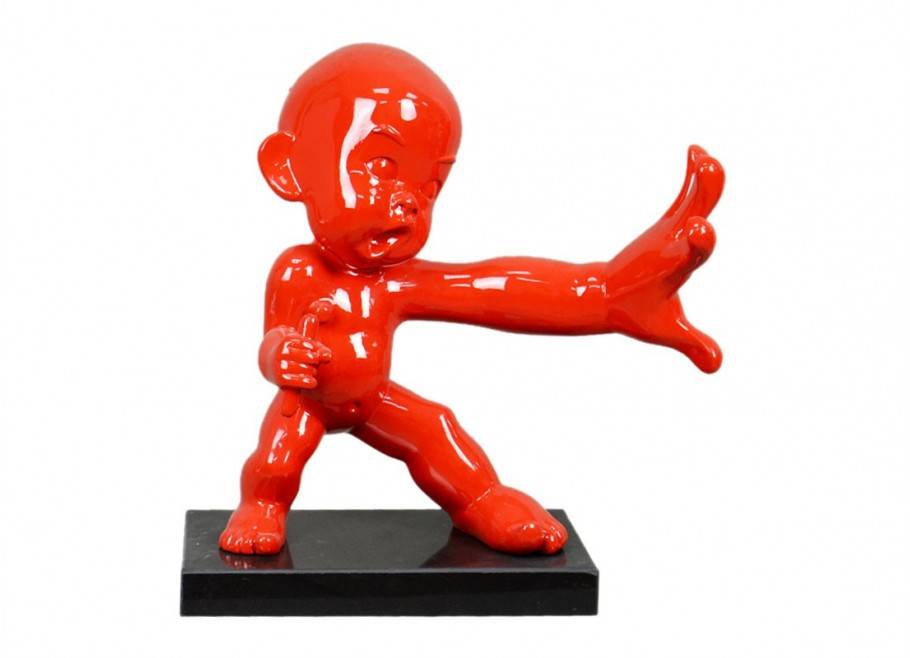 Statue of a baby ninja in red color
