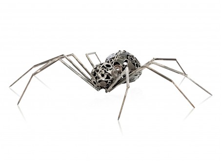 Spider sculpture in motorbike parts