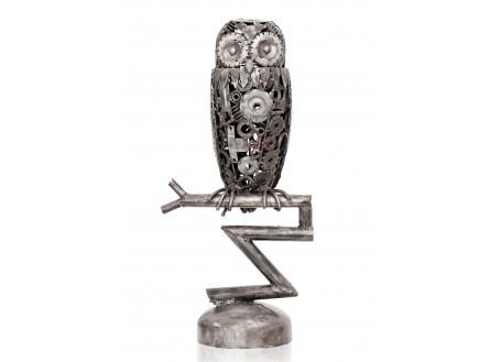 Owl sculpture made of motorbike parts