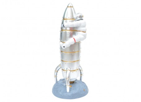 Statue of an astronaut and his rocket in resin